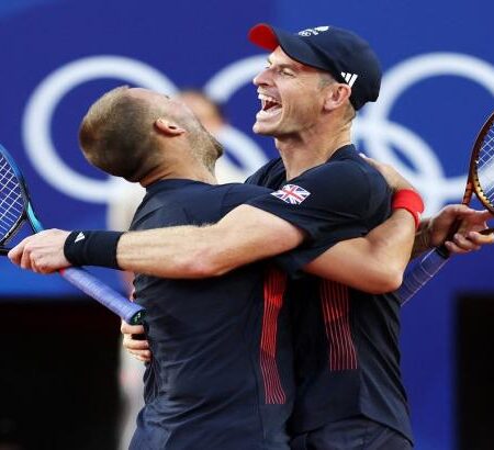 Dan Evans and Andy Murray playing doubles at the Paris Olympics.